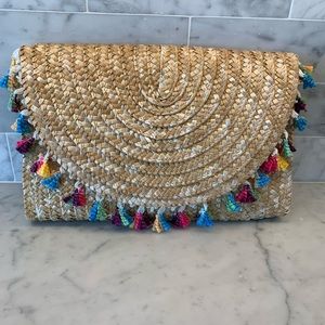New with tags Bon Voyage Clutch Handbag with multicolored tassels